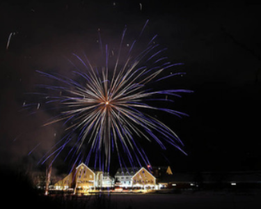 Fireworks over building