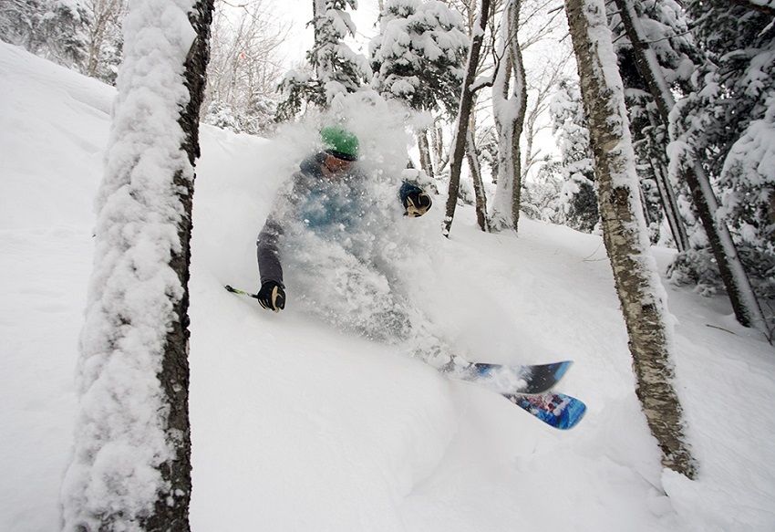 Carter Davidson ripping up Cannon glade in fresh powder photo by Greg Keeler