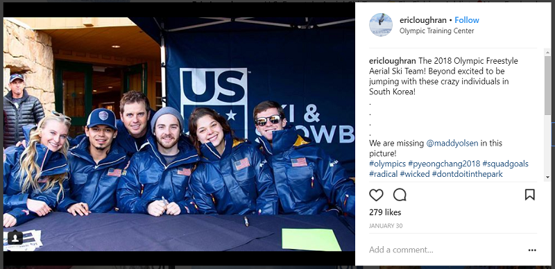 Eric Loughran with teammates in blue jackets