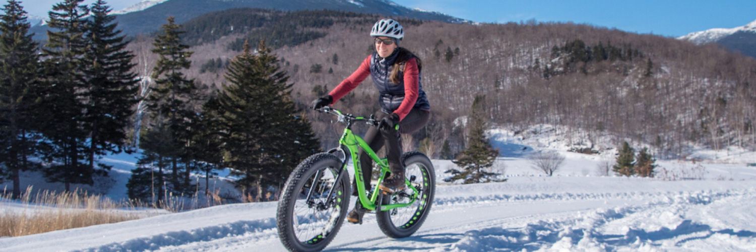 Woman winter biking at Great Glen Trails