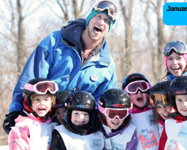 Group of kids and instructors making silly faces