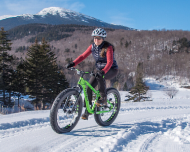 Woman winter biking at Great Glen Trails
