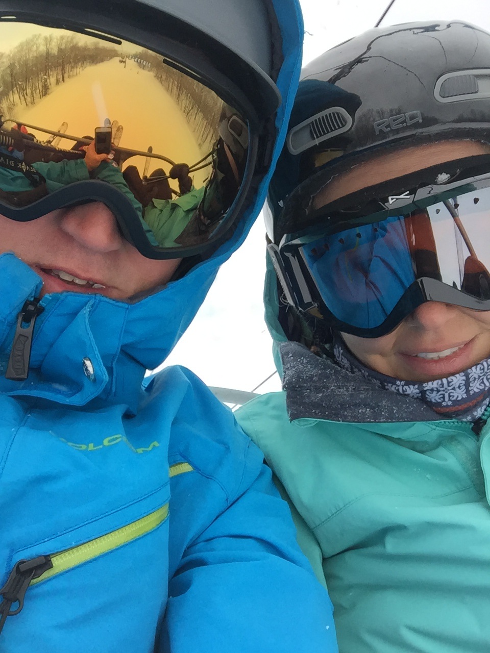 chairlift selfie mirrored goggles blue jacket