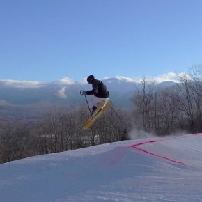 Skier gets air in the Terrain Park in Bretton Woods