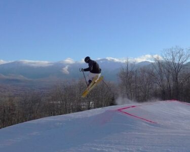 Skier gets air in the Terrain Park in Bretton Woods